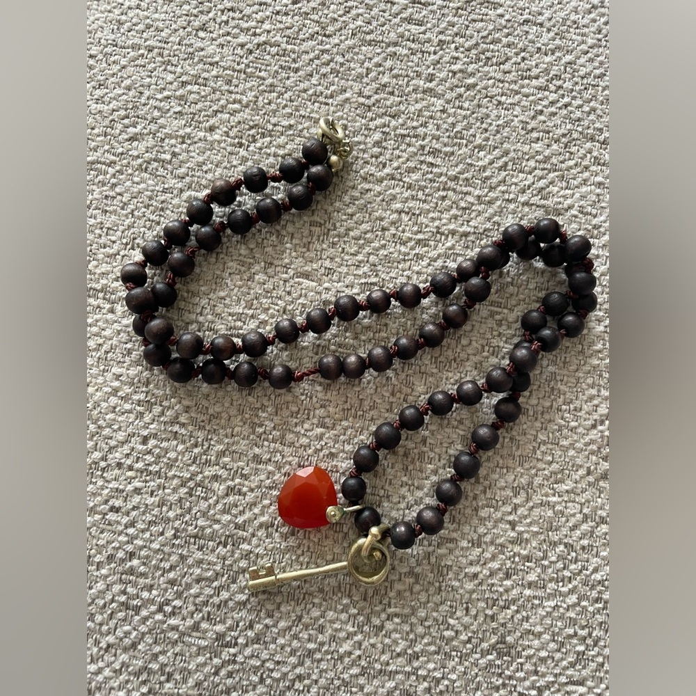 Fossil Dark Brown Beaded Necklace with Red Heart and Gold Key
